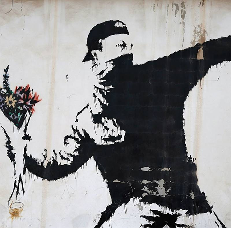 banksy throwing flowers